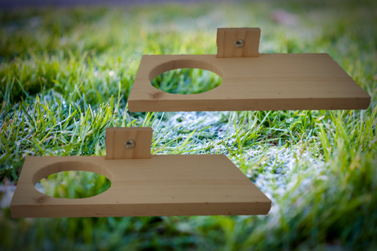 two kiln-dried pine ledges with a large  jump through hole to the left of each. 